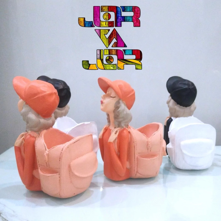 جامدادی رومیزی و جای قلم ارسال رایگان مجسمه دختر کوله پشتی دکوری